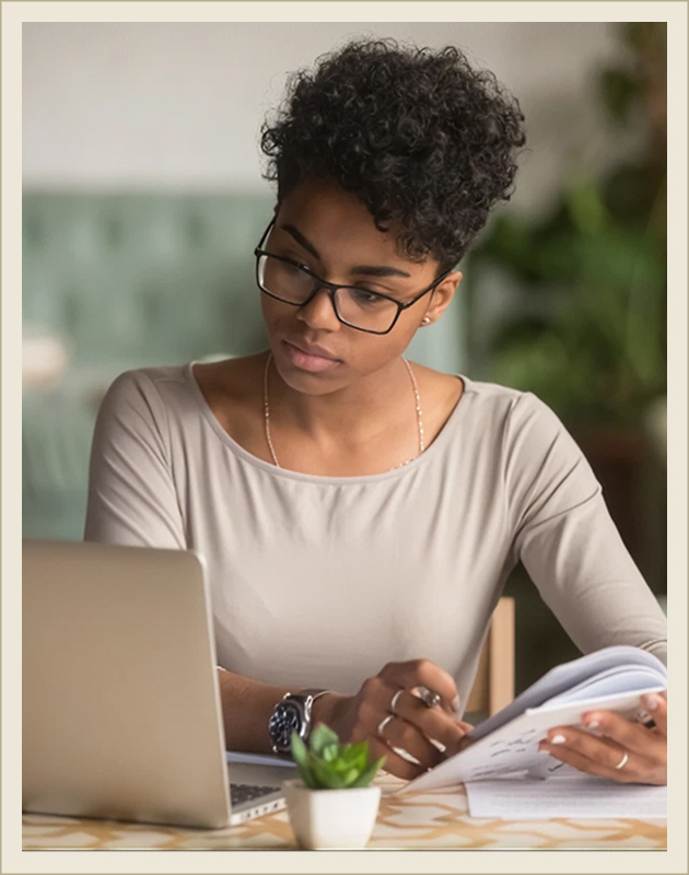 Tutor reviewing study materials with a student online